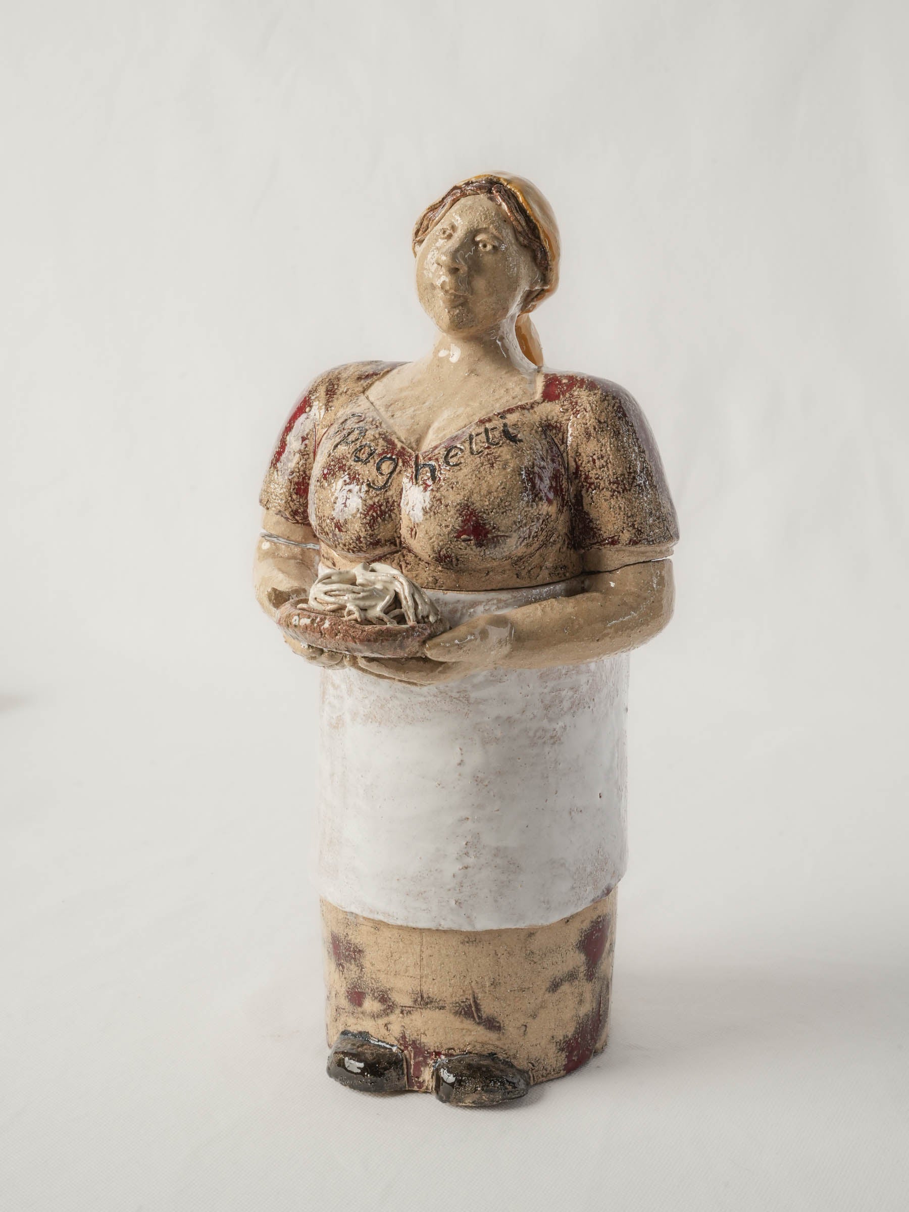 Warm glazed ceramic spaghetti jar