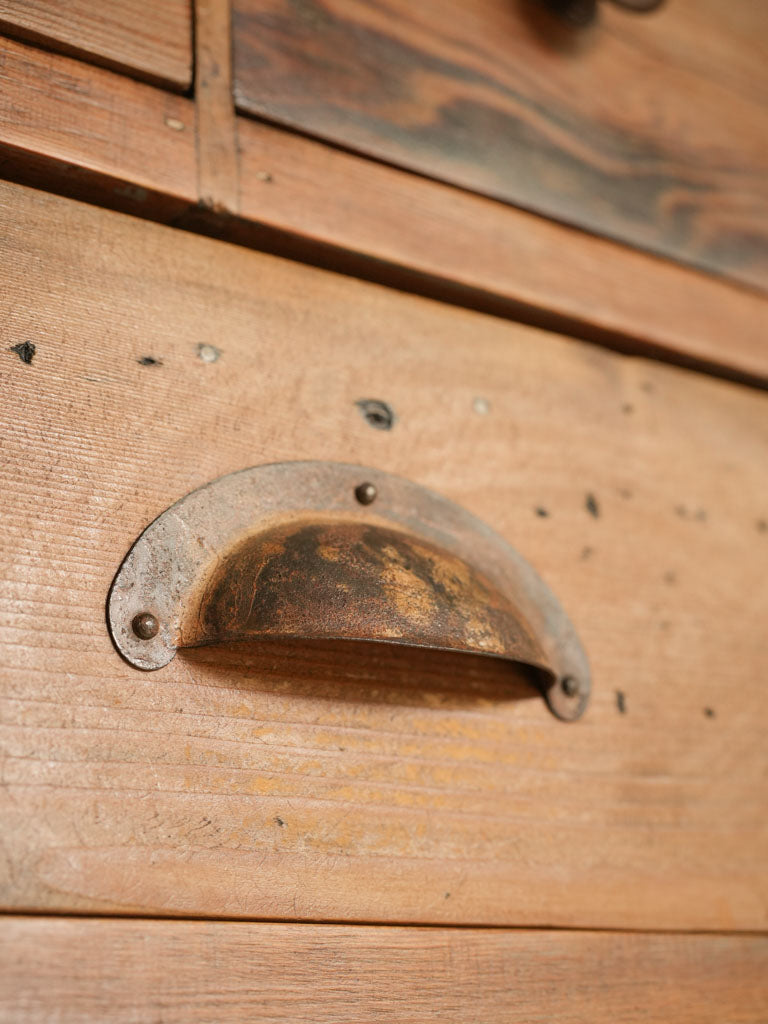 Honey-toned wood multi-drawer cabinet