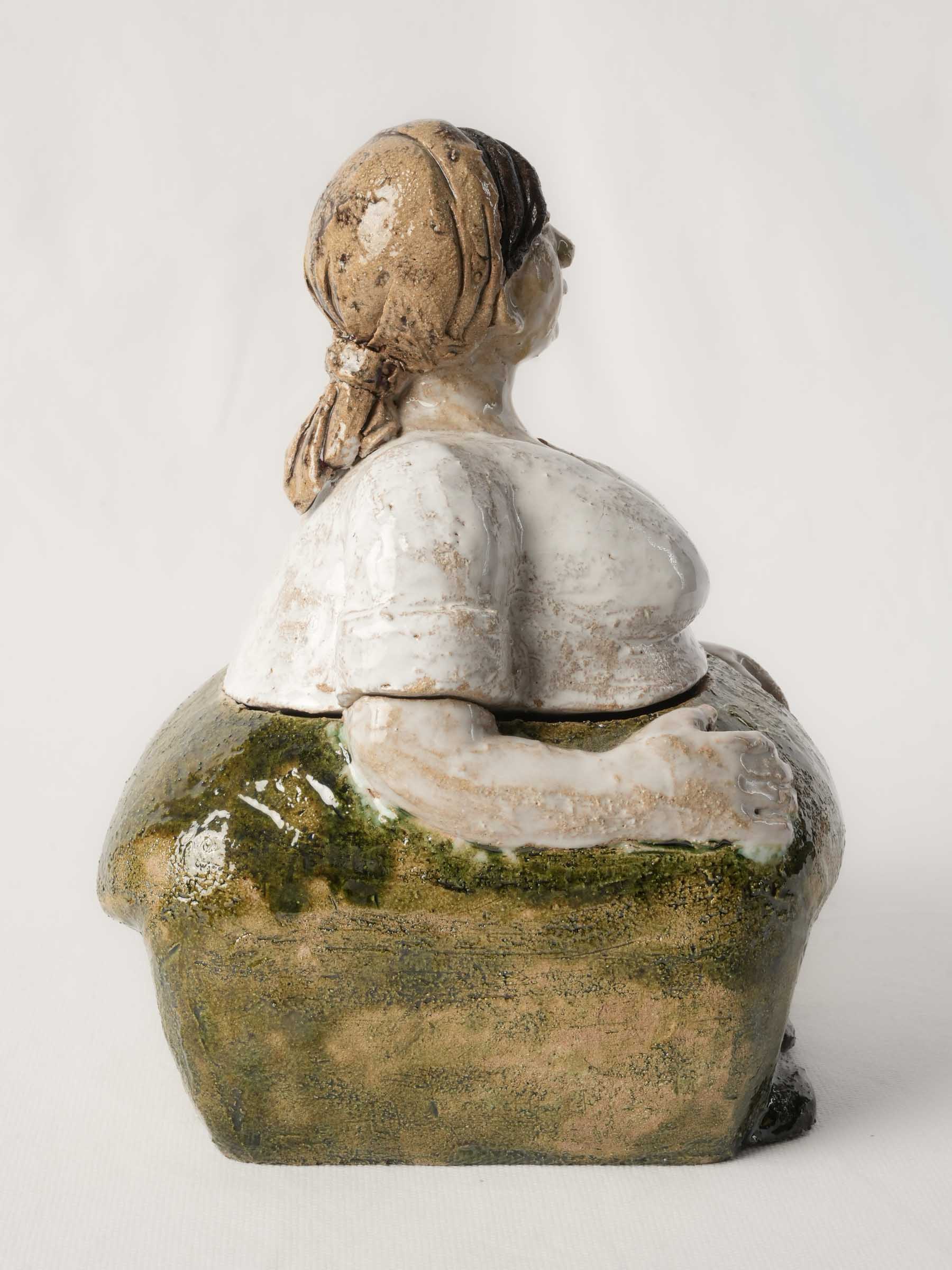 Unique character ceramic herb jar.