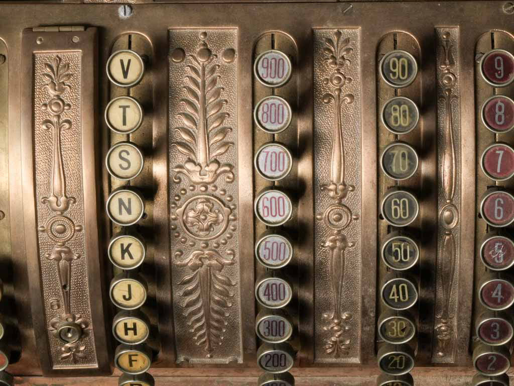 Richly molded scrolls cash masterpiece  