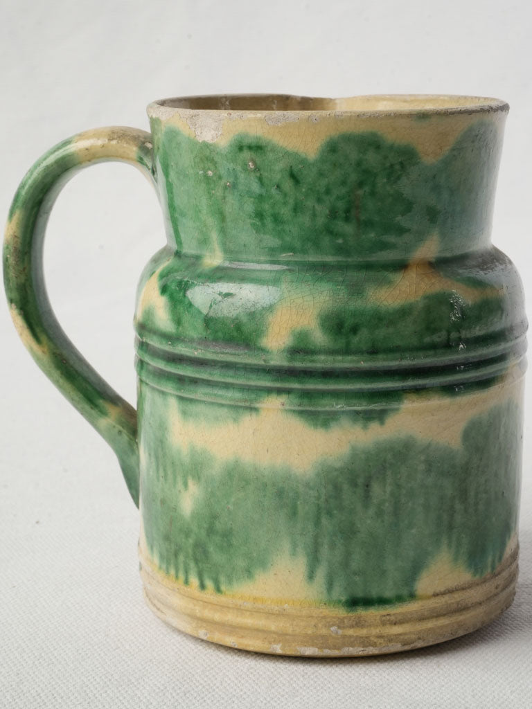 Characterful green-glazed earthenware vessel  