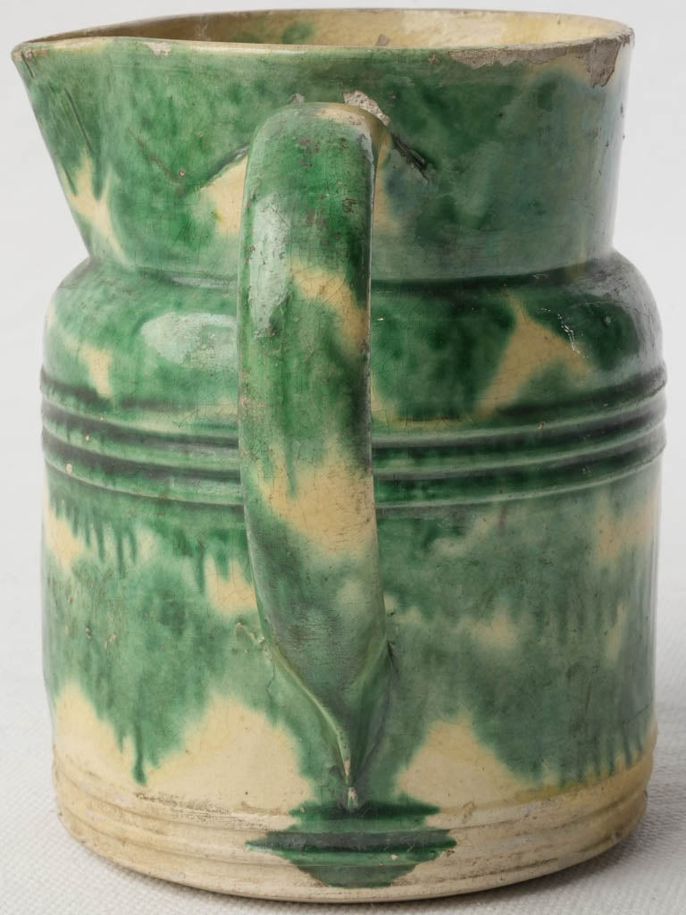 Patina-rich provincial pottery jug  
