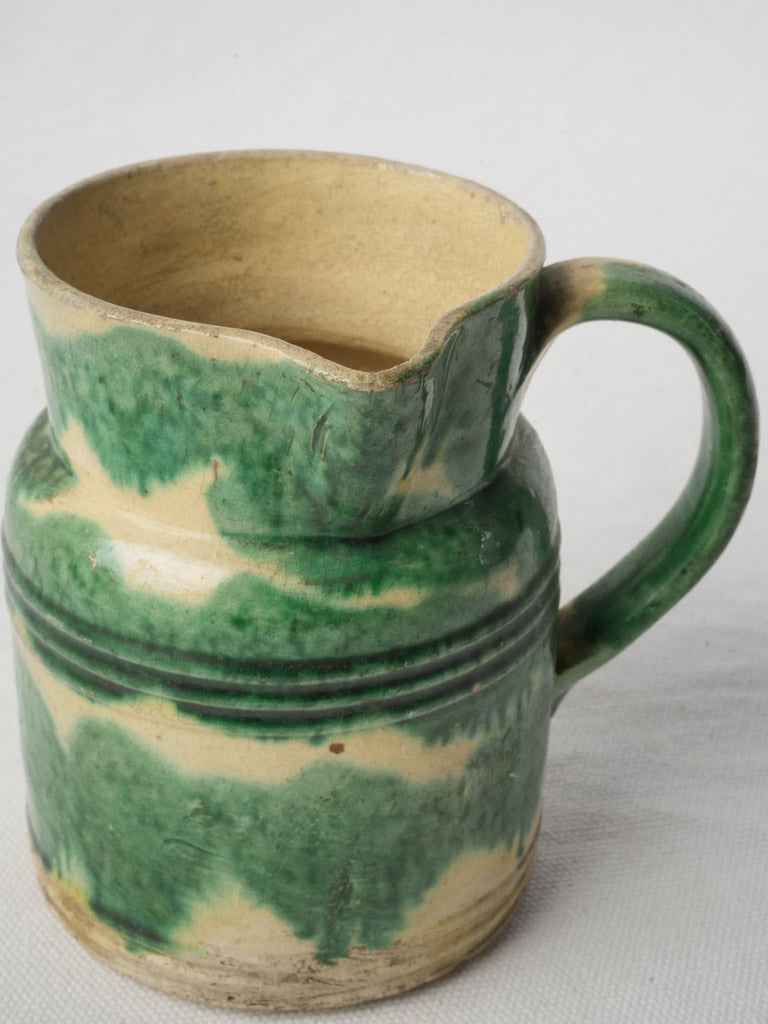 Timeworn French ceramic milk pot