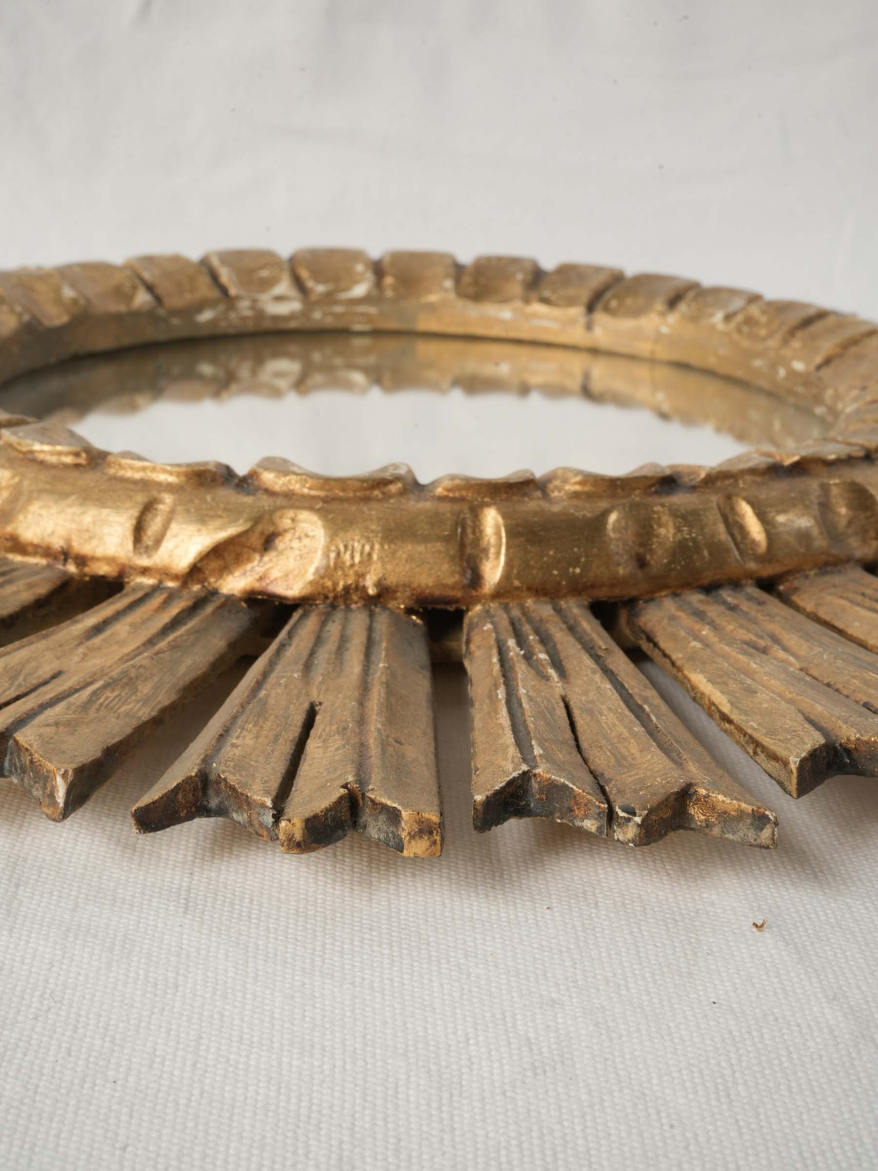 Antique gilded sunburst mirror