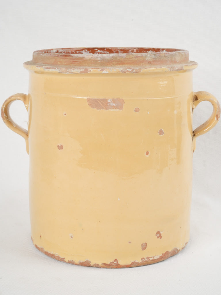 Antique French yellow ceramic preserving pot