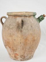 Traditional three-handled French terracotta pot