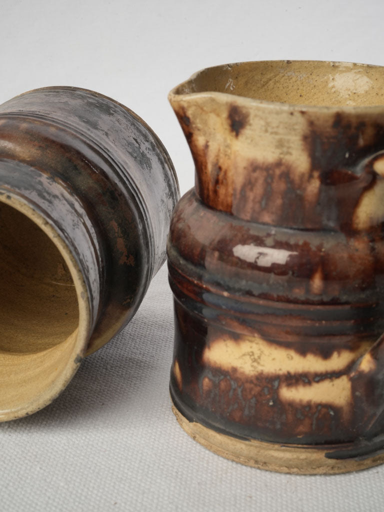 Profoundly aged ceramic pitchers  