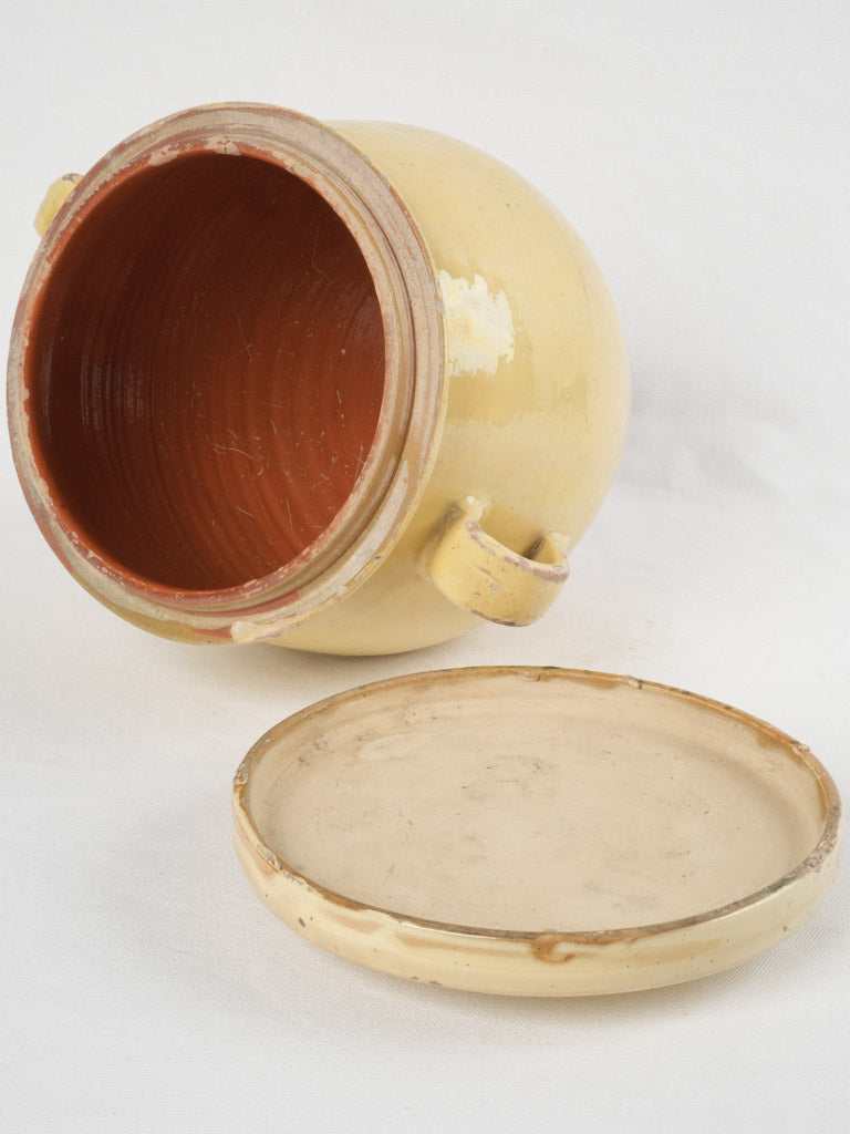 Traditional French yellow-glazed preserve pot