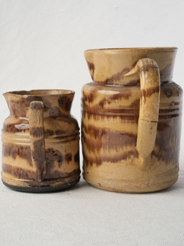 Stout cylindrical French milk jugs  