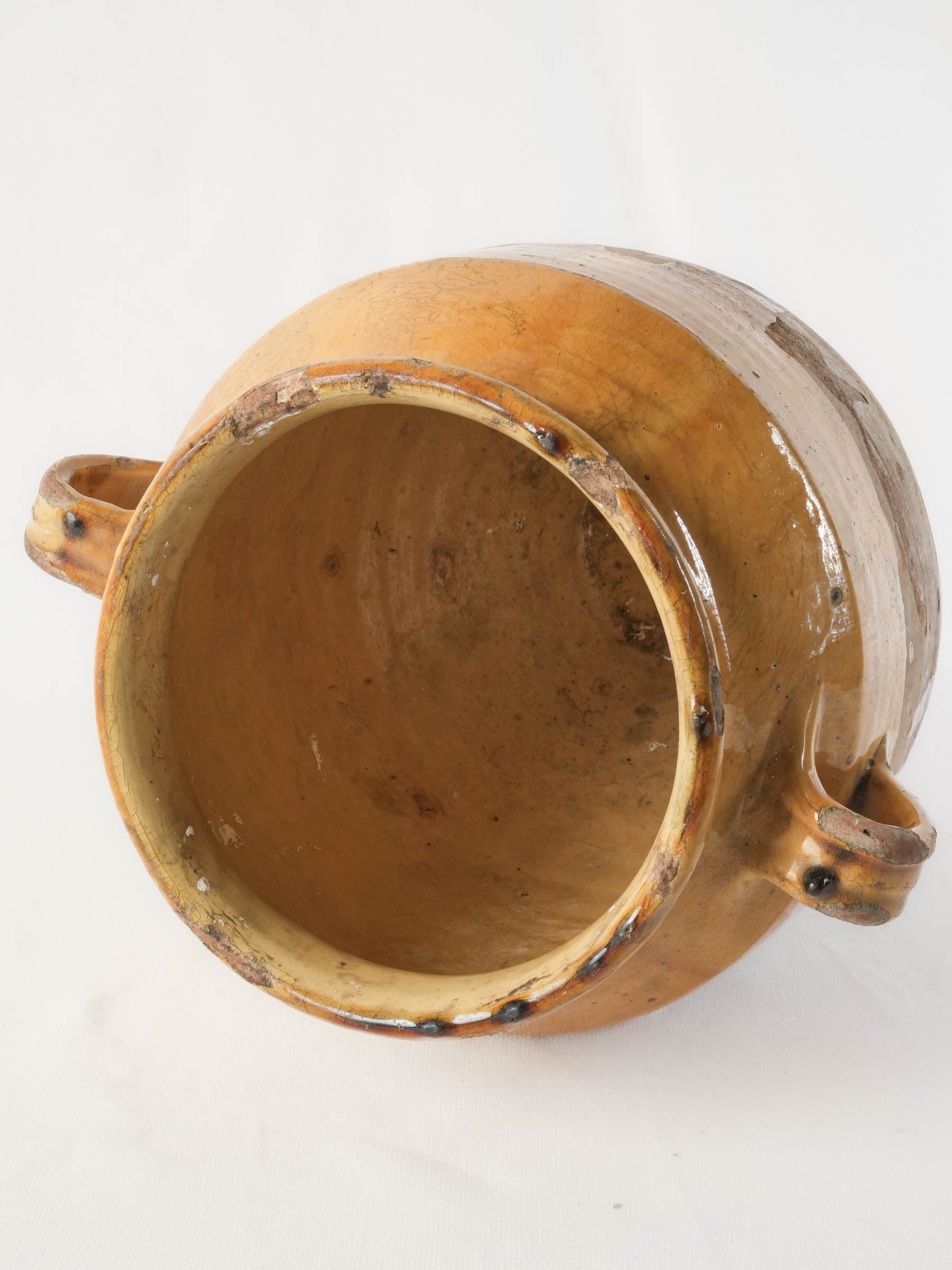 Historic glaze-worn French ceramic container  