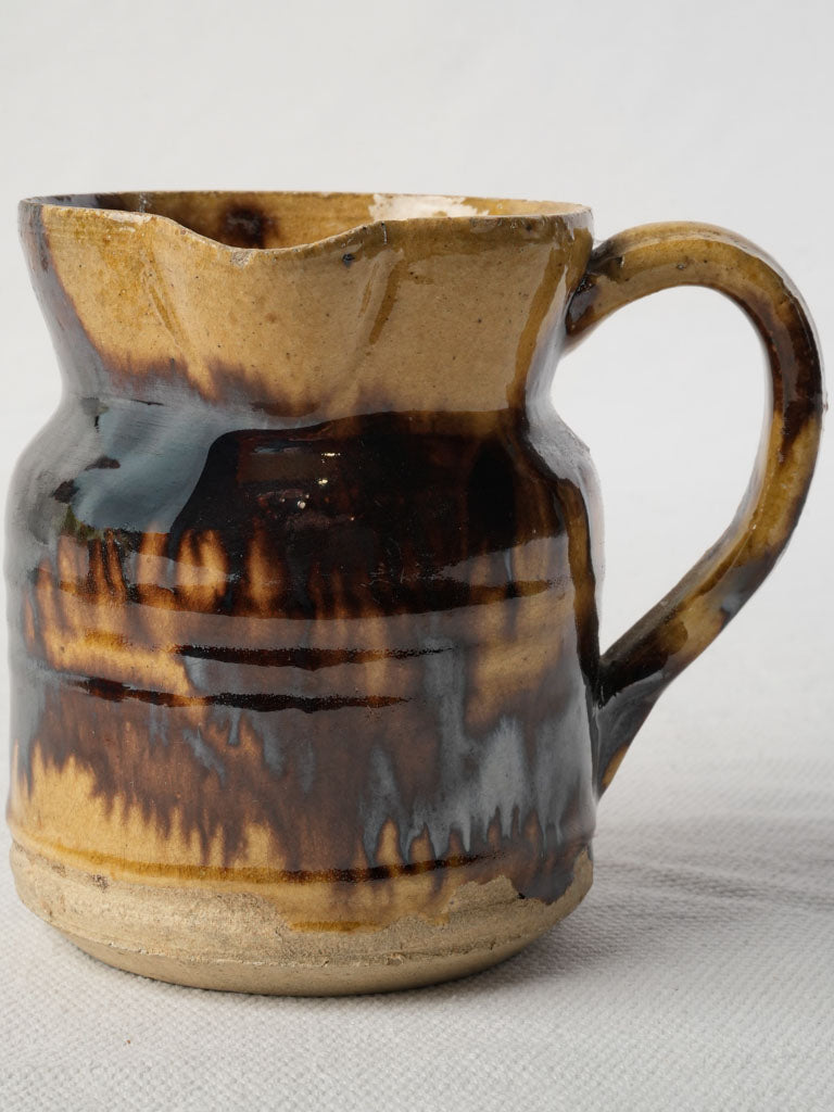 Antique rustic earthenware pitcher