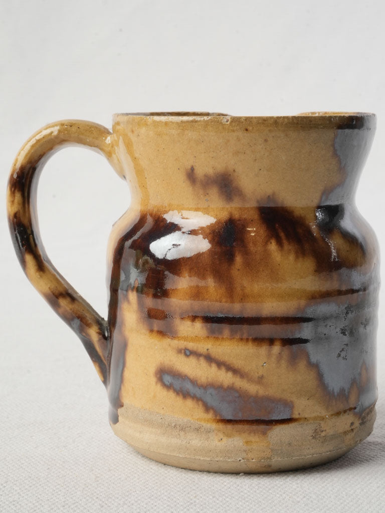 Timeworn wood-fired clay pitcher