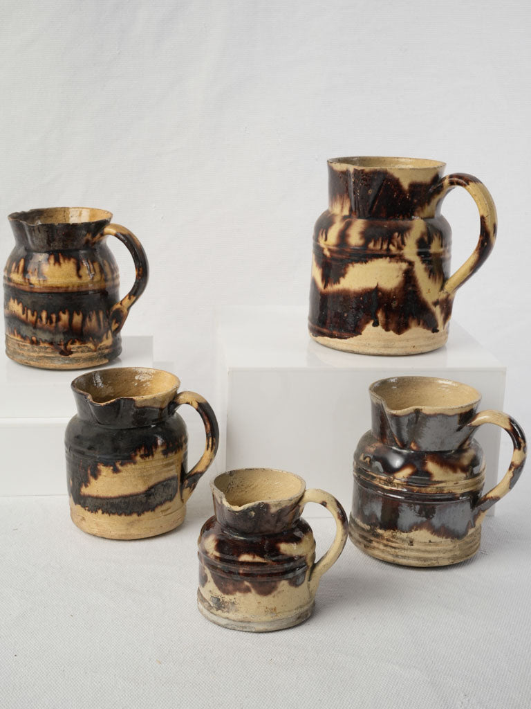 Graduated Set Of Five Early 20th Century Dieulefit Ceramic Pitchers