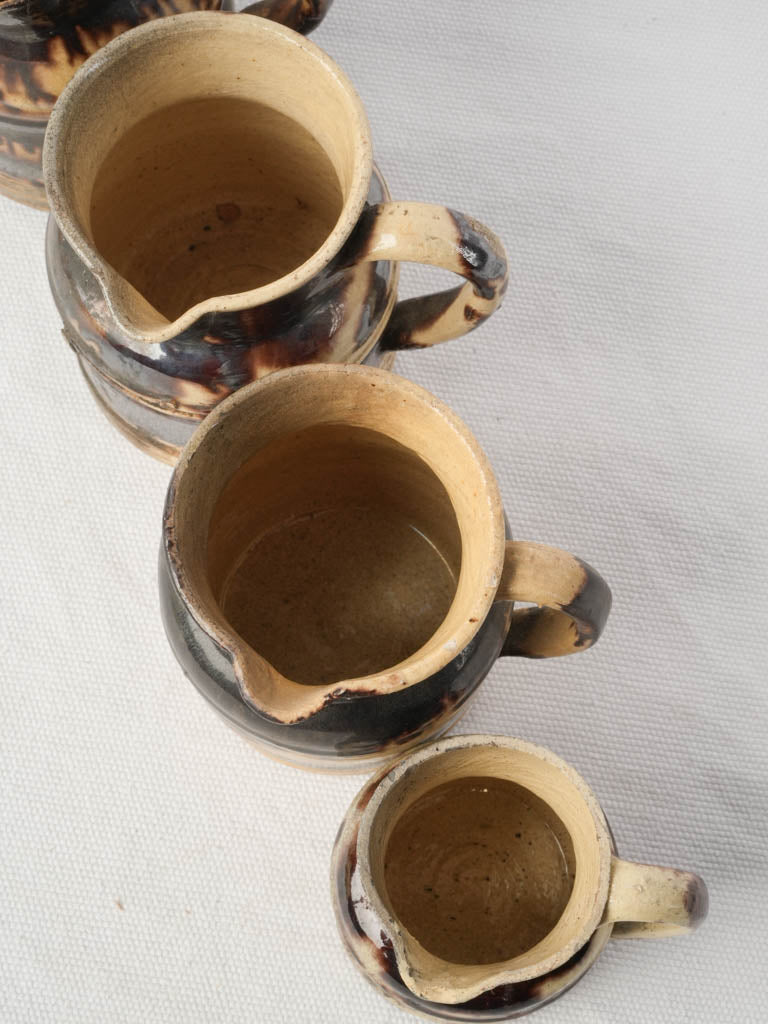 Graduated Set Of Five Early 20th Century Dieulefit Ceramic Pitchers