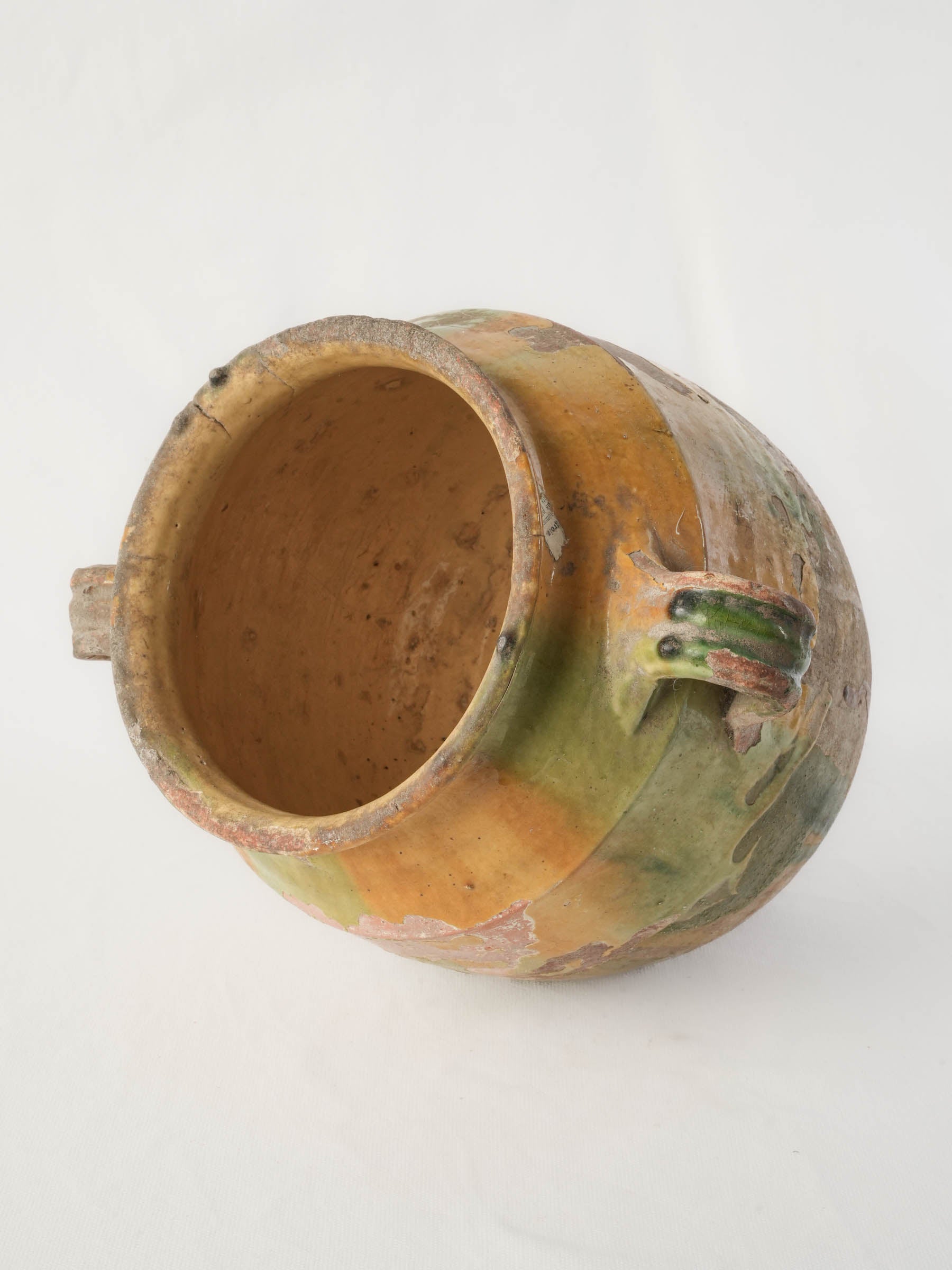 Asymmetrical handled antique confit pot