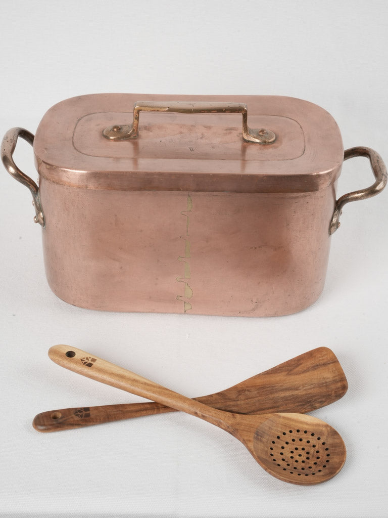 Elegant tarnished copper cooking pot