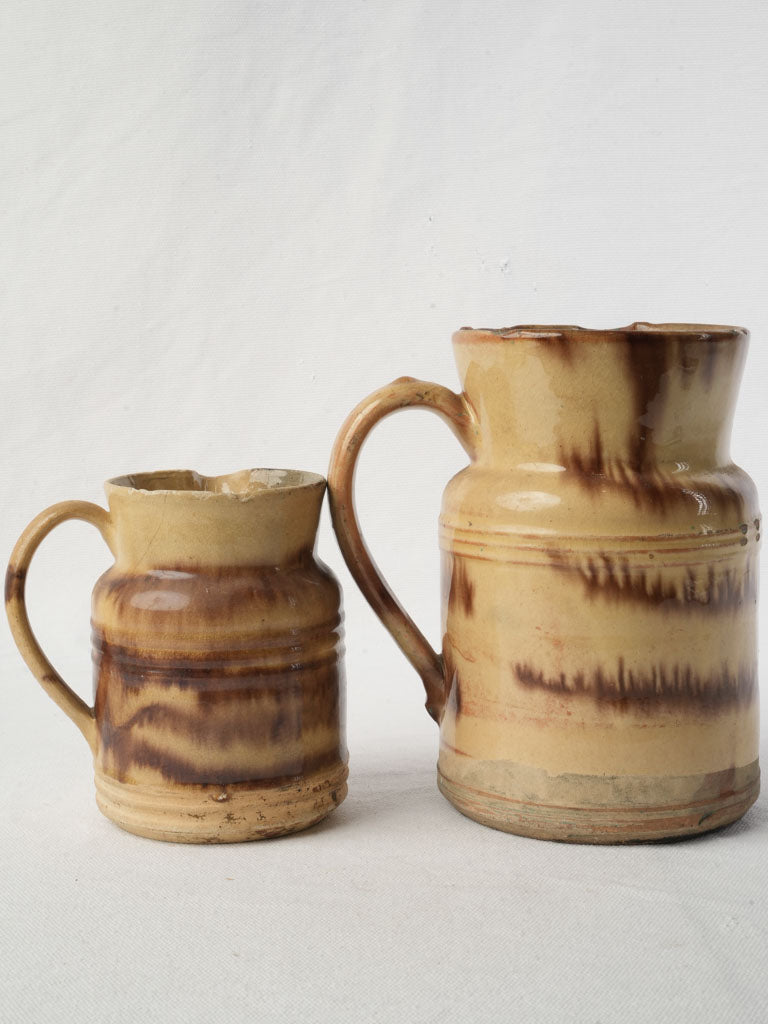 Banded glaze earthenware pitchers