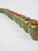 Charming glazed olive-green ceramic pots