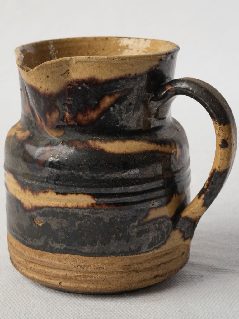 Antique rustic earthenware creamer