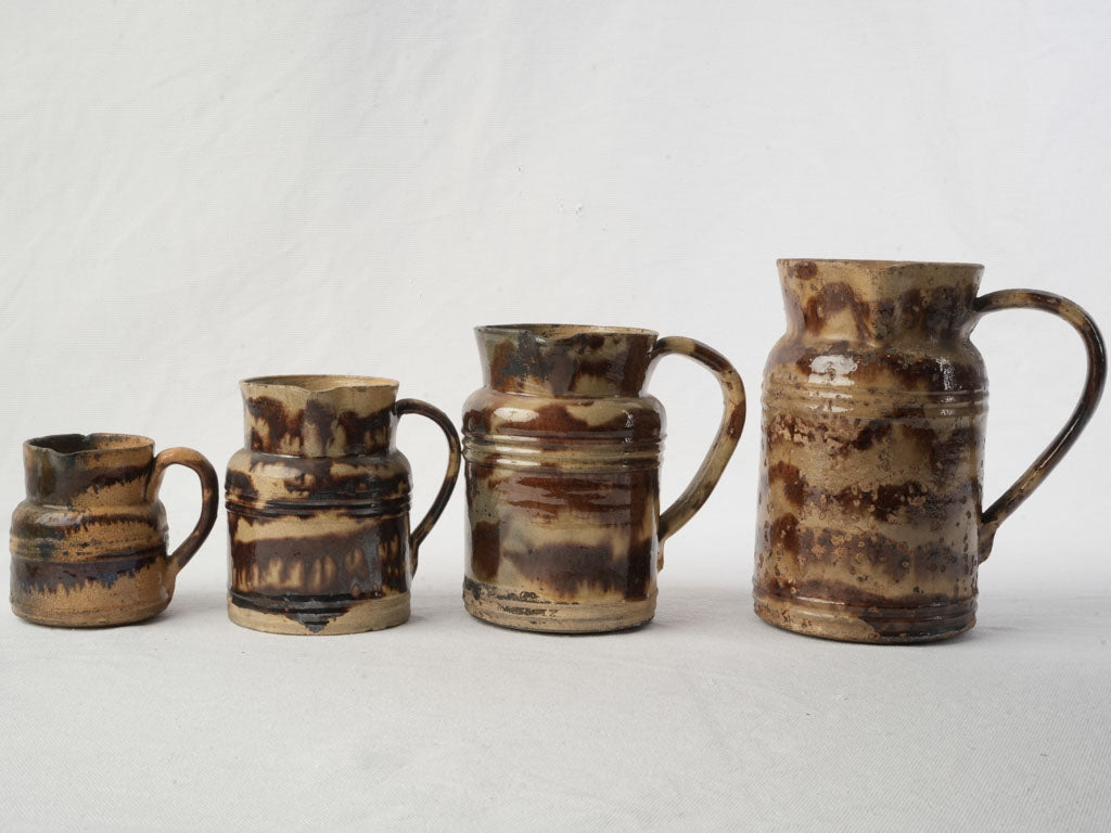 Antique graduated ceramic vases