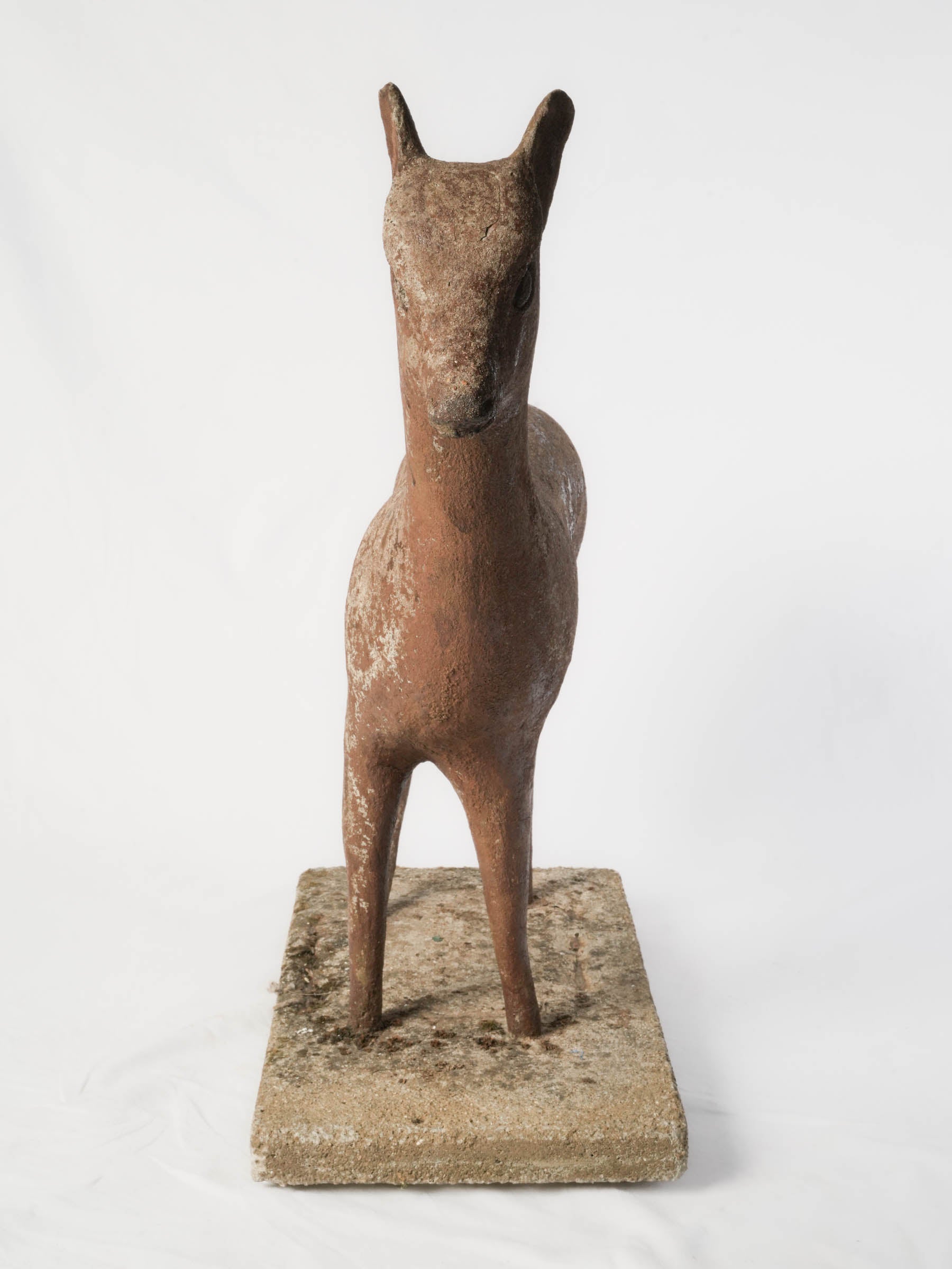 Simplified concrete doe ornament  