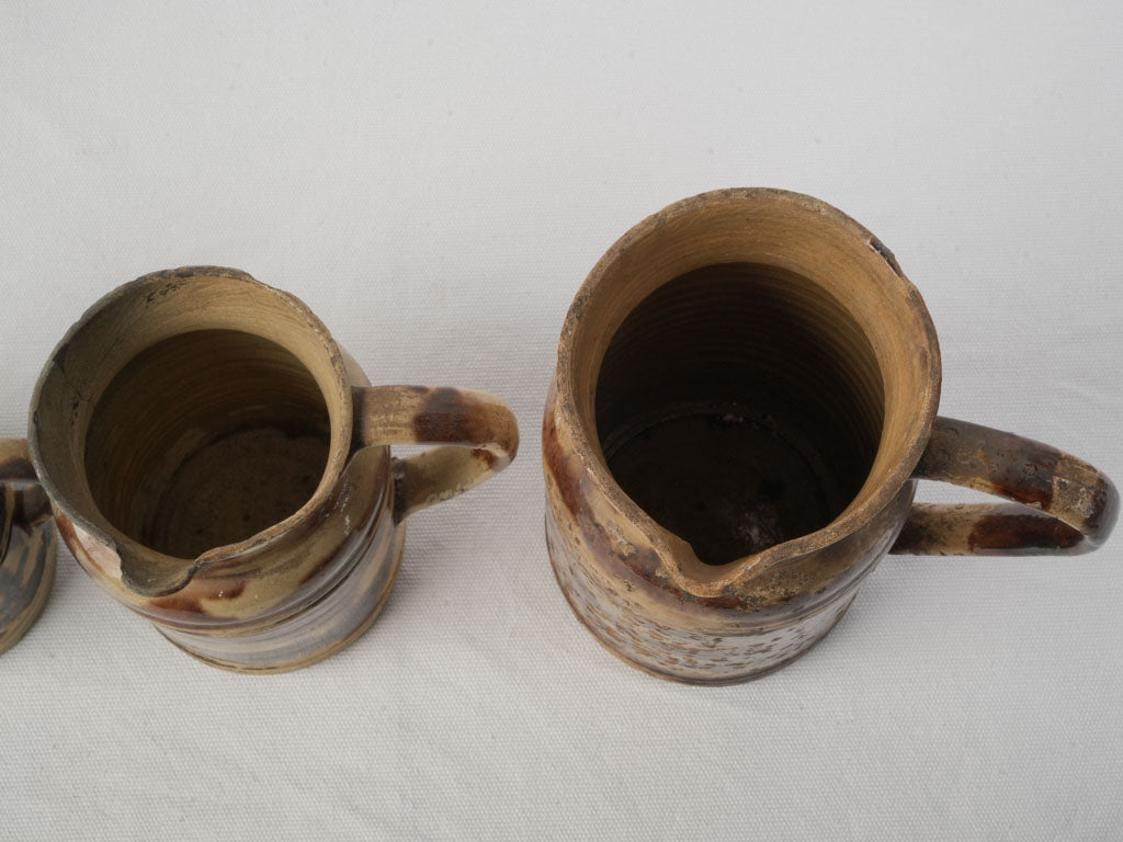 Authentic worn patina pitchers