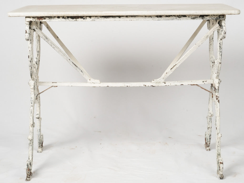 Weathered antique cast iron patio table