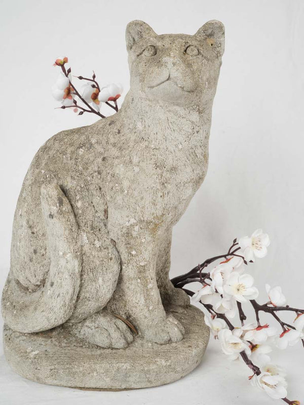 Whimsical reconstituted stone cat sculpture