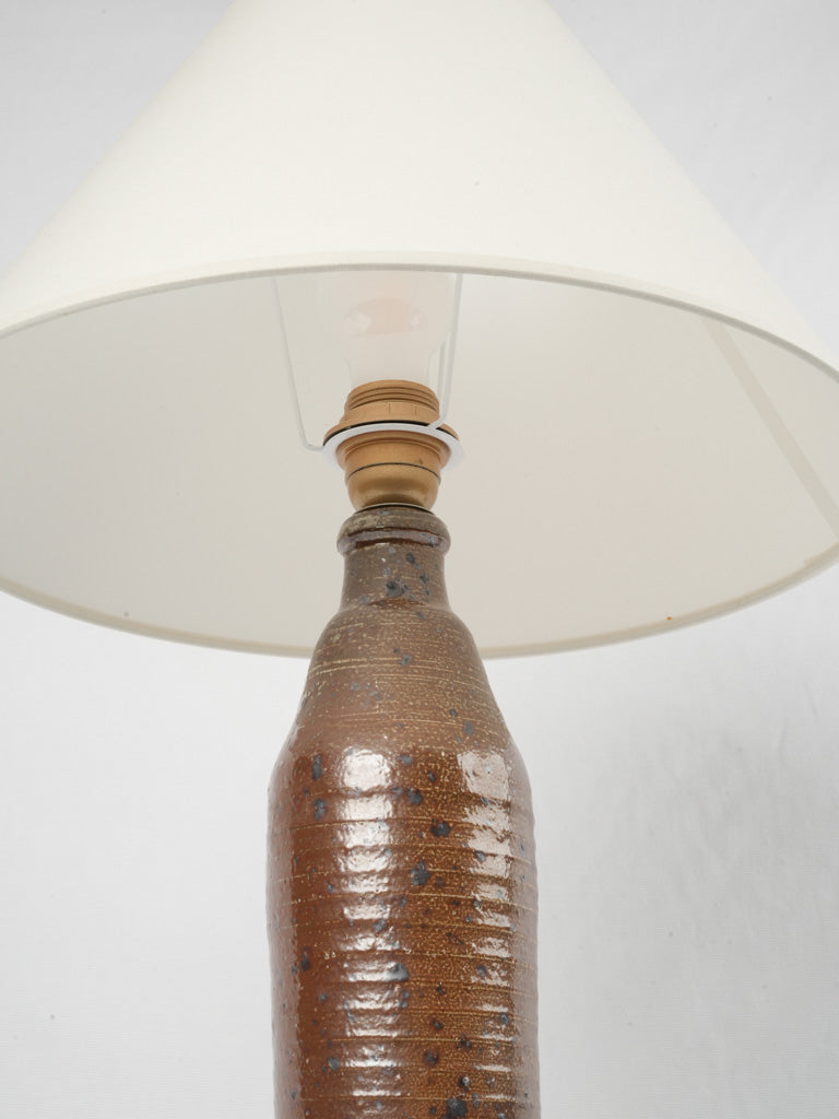 Elegant linen-shade stoneware lamp