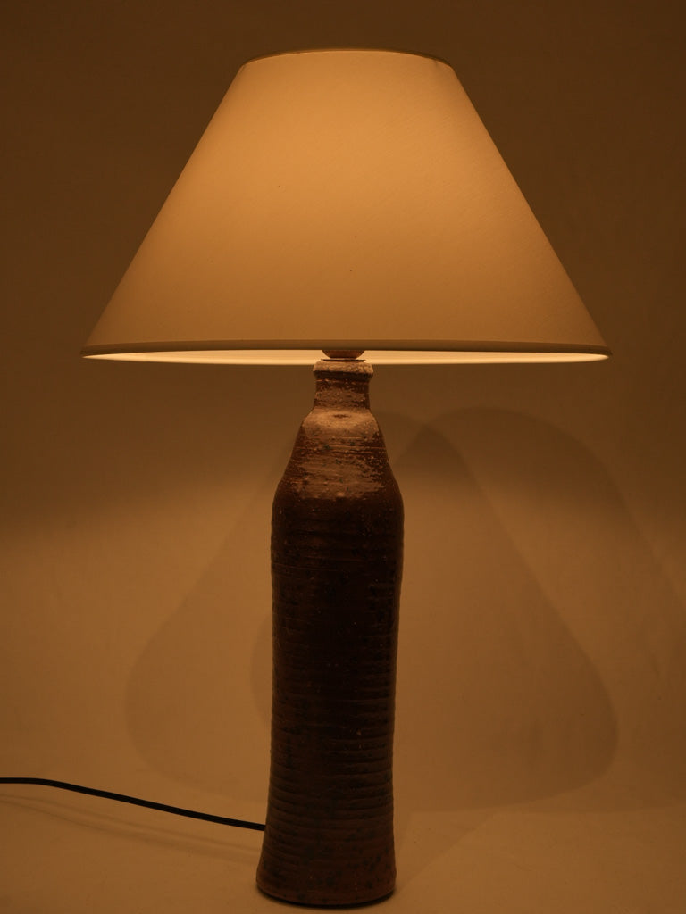 Artisanal brown vintage lighting piece