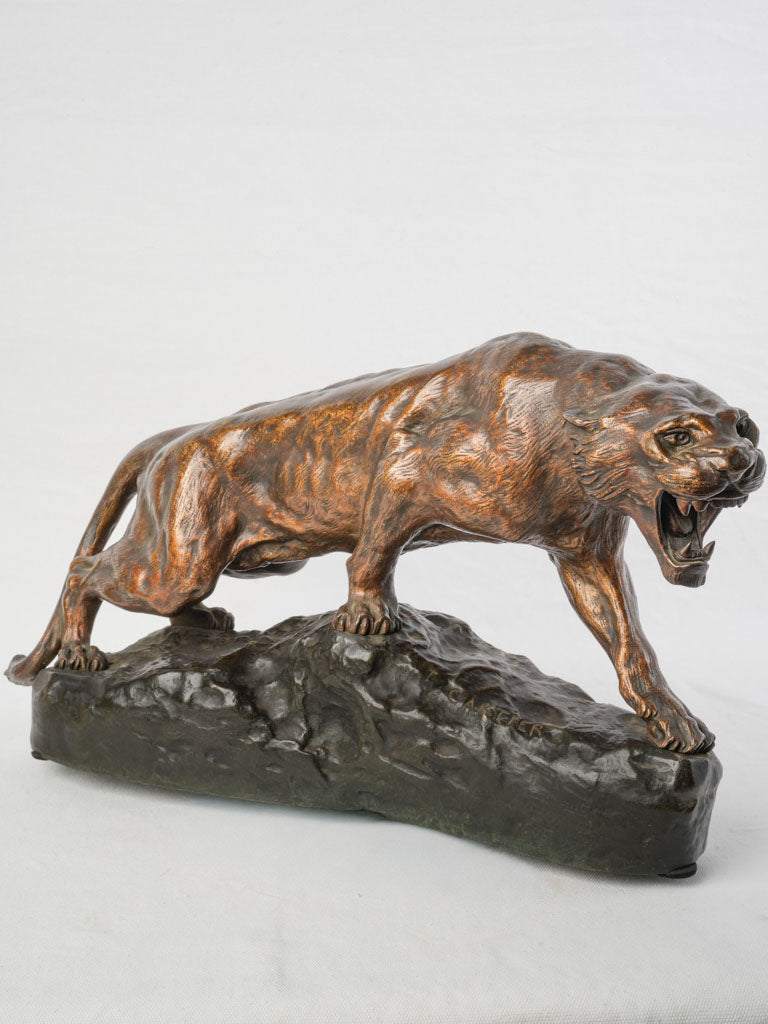 Expressive bronze feline sculpture