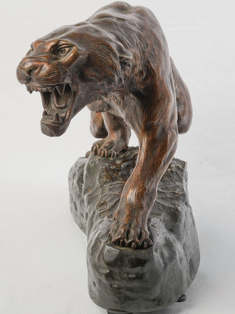 Refined bronze predator sculpture