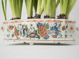 Timeless earthenware planter with red motifs