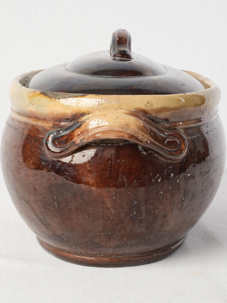 Decorative aged French pottery tureen