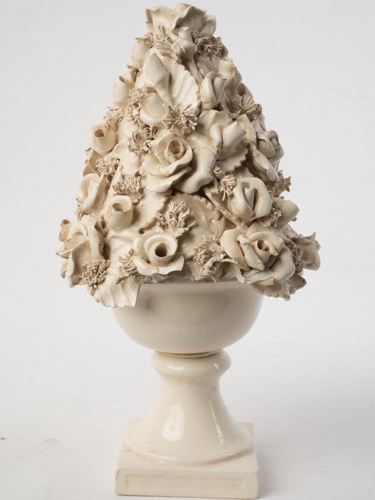 Time-worn handcrafted flower sculpture