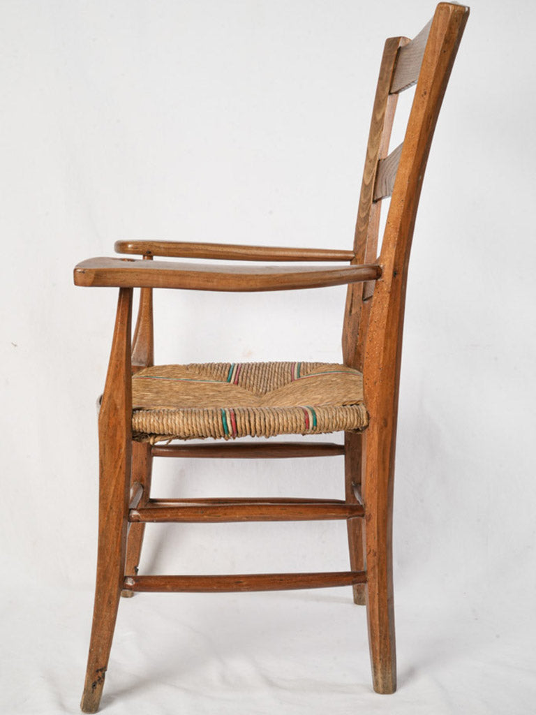 Rustic handwoven straw seat armchair  