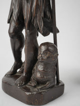 Aged fruitwood statues with character