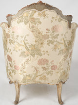 Refined antique bergère with rose cresting