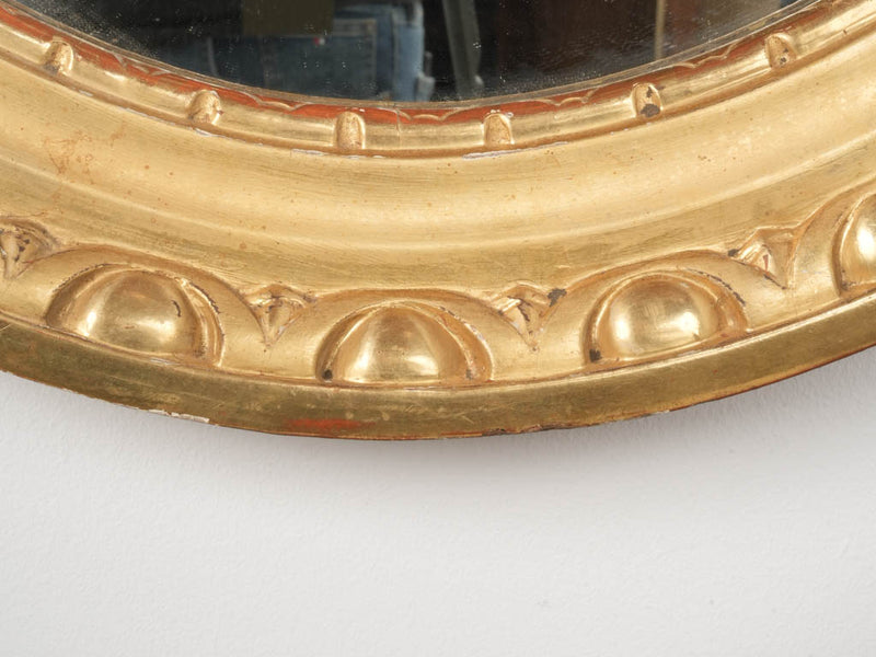 Ornamental French antique oval mirrors