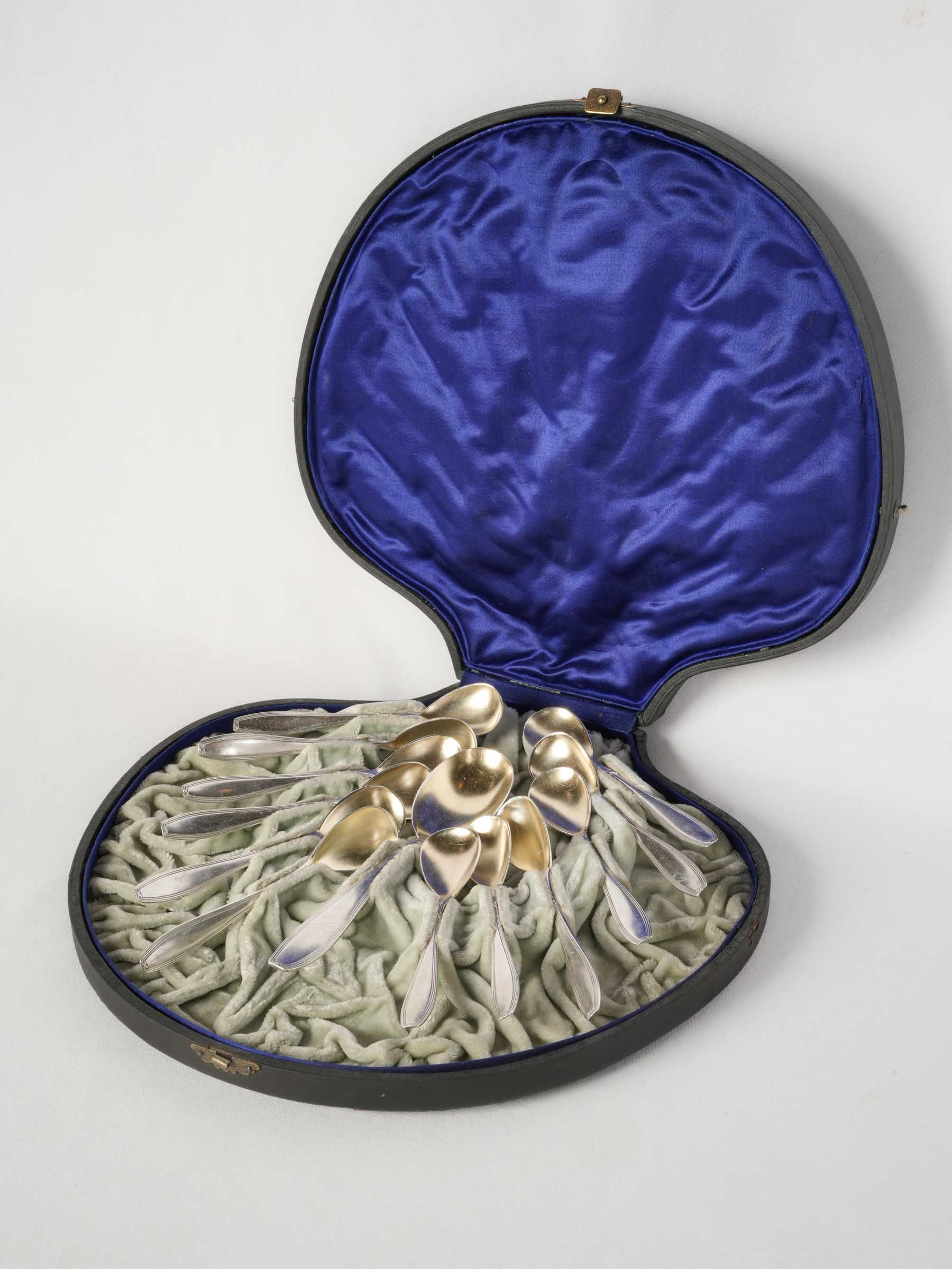 French Ice Cream Service in Striking Sapphire-Blue Shell-Shaped Case, Early 20th Century.
