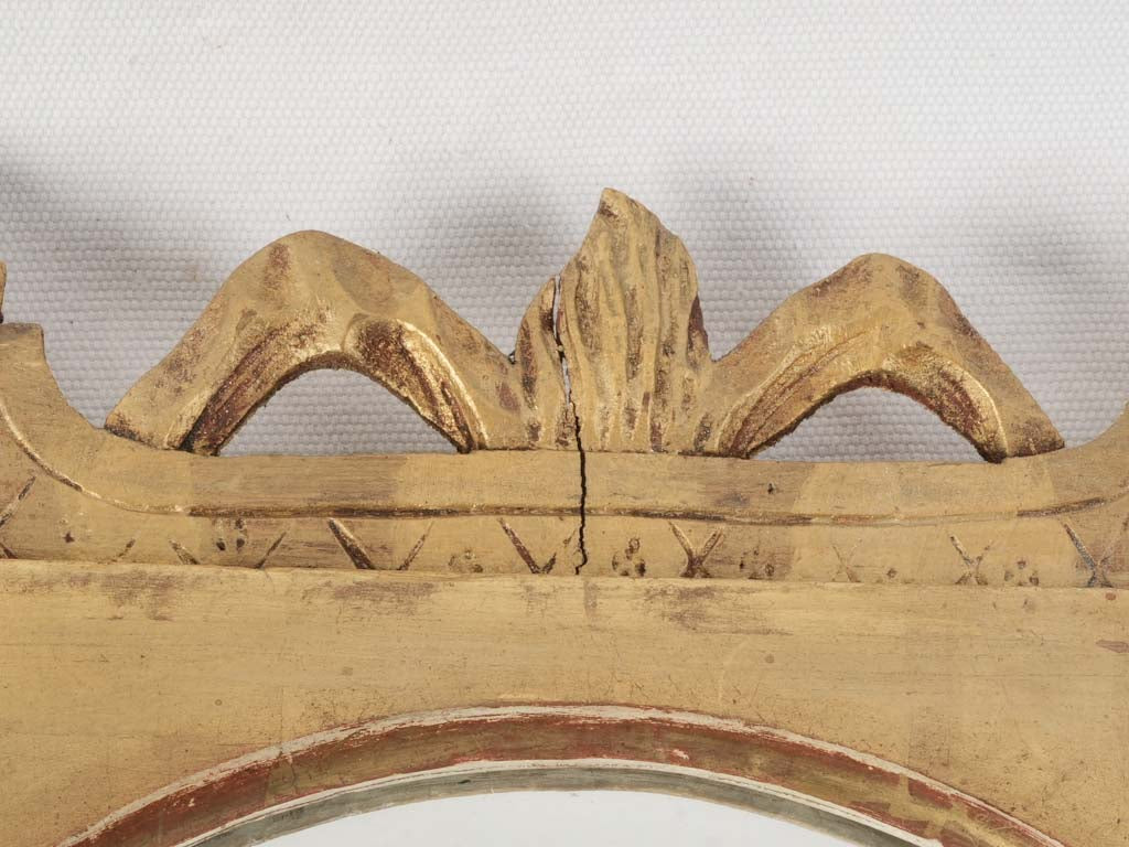 Timeless water-gilded oval mirrors  