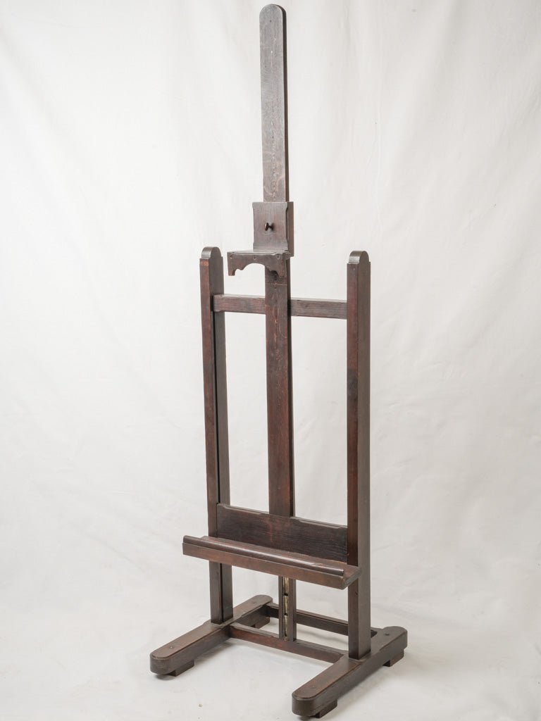 Antique dark-stained oak easel  