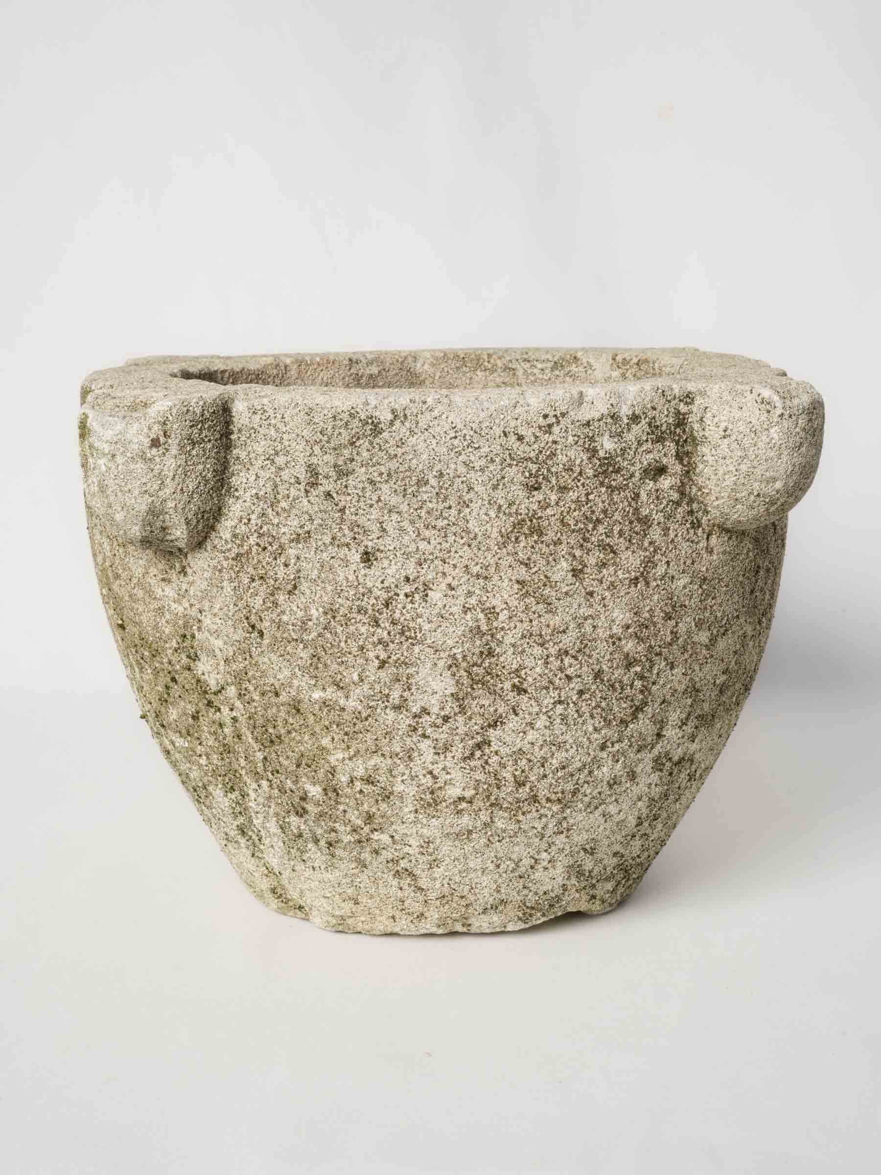 Vintage grey-toned stone mortar  