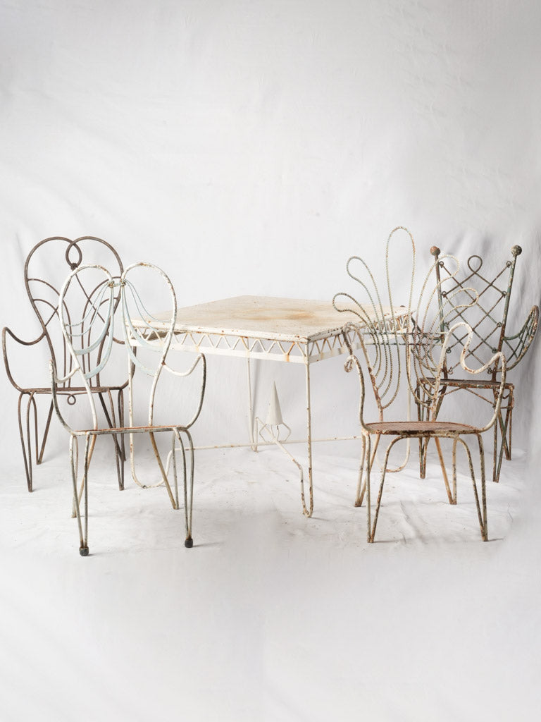 Enchanting antique wrought iron chairs  