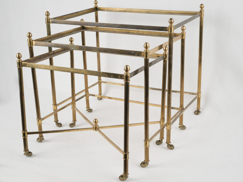 Vintage brass nesting tables with acorn finials