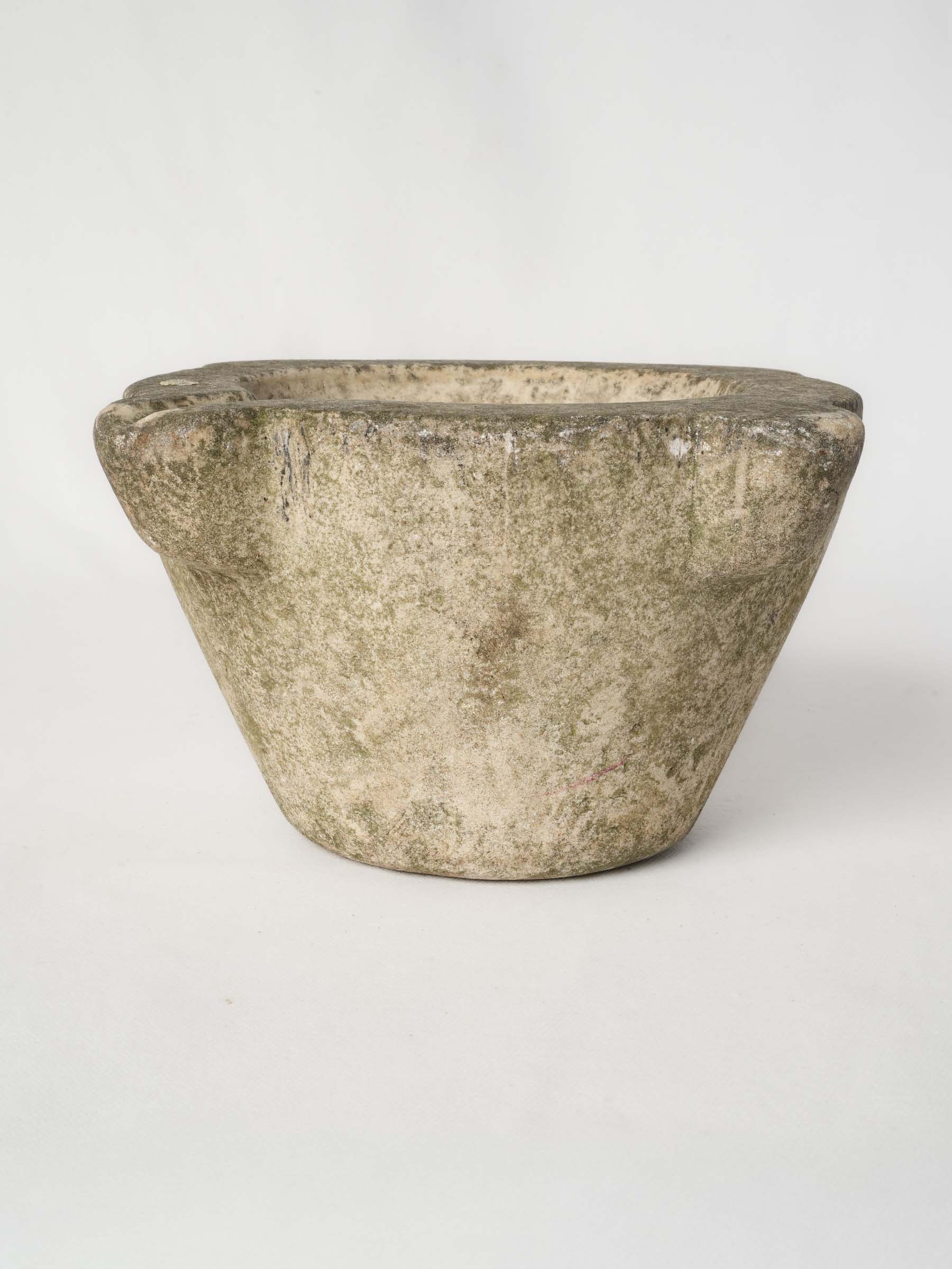 Hand-carved grey-beige mortar