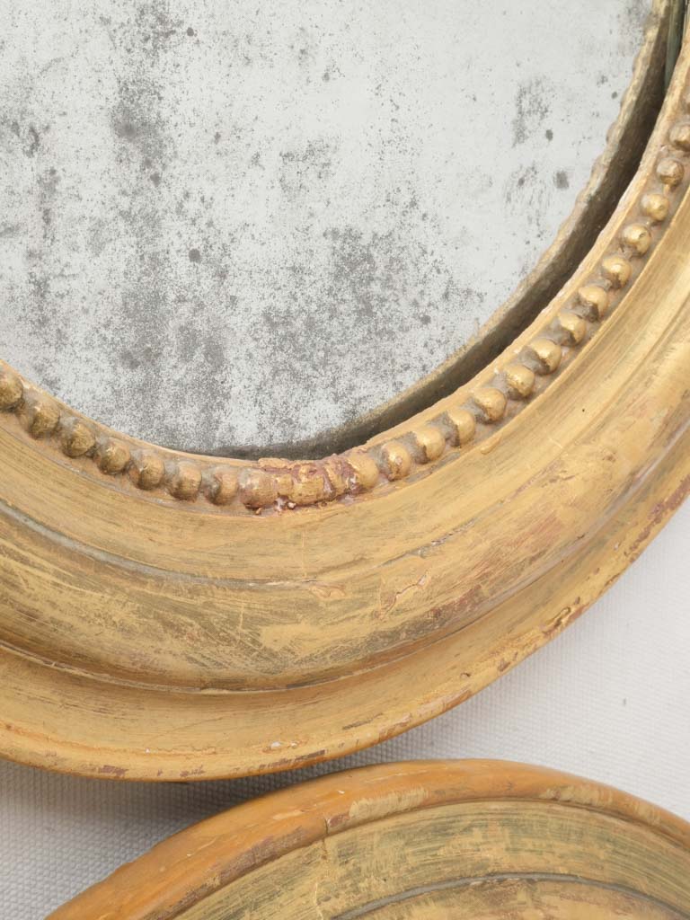 Giltwood framed symmetrical mirrors  