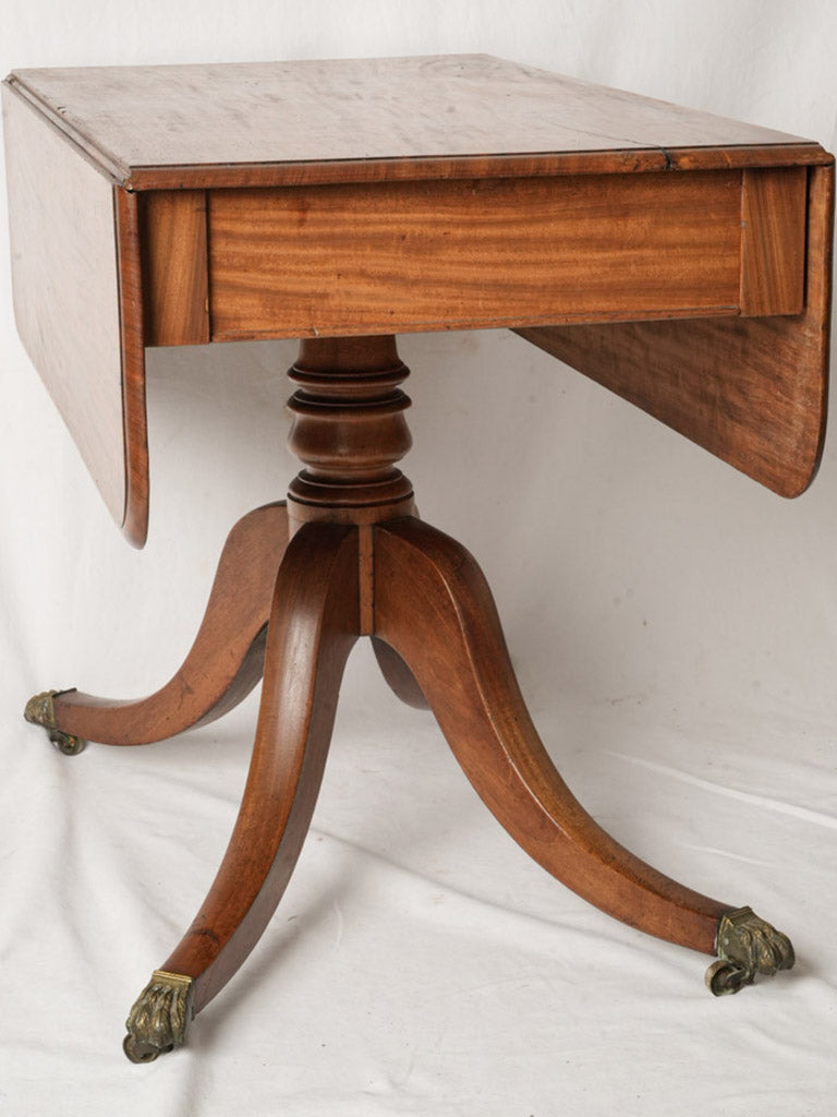 19th-century lion paw feet table