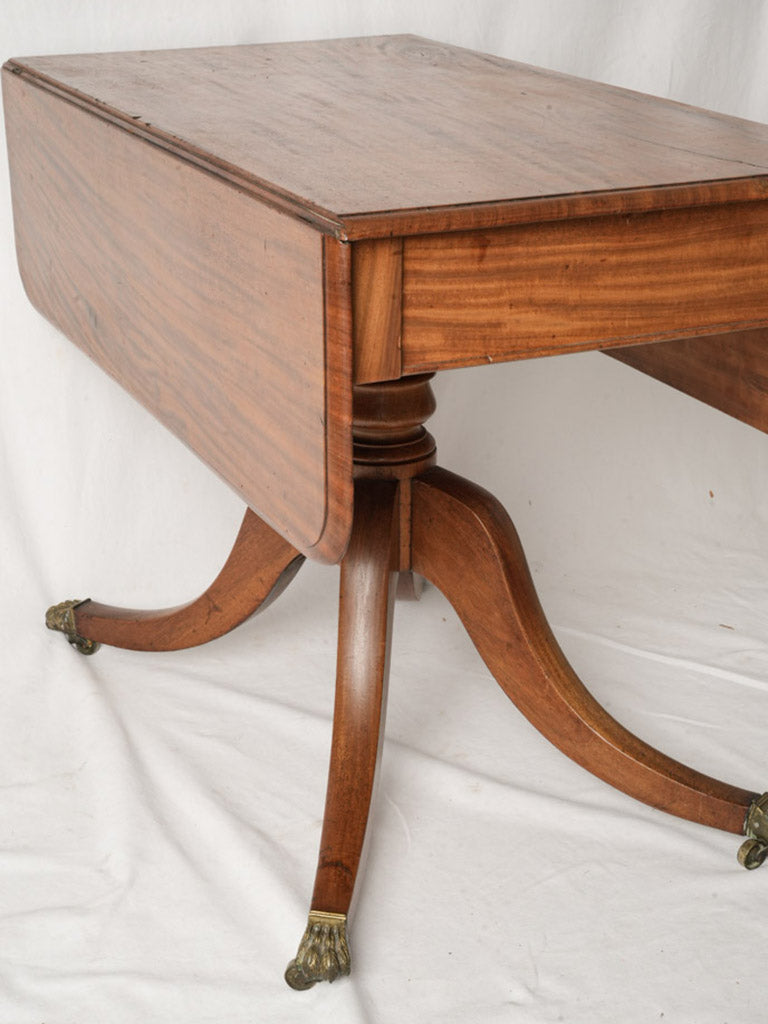 Warm-toned drop-leaf table