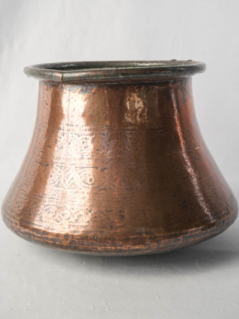 Hand-hammered copper container